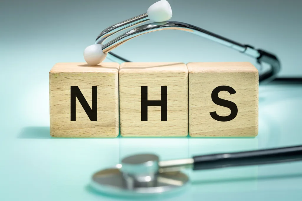 NHS letters on wooden blocks
