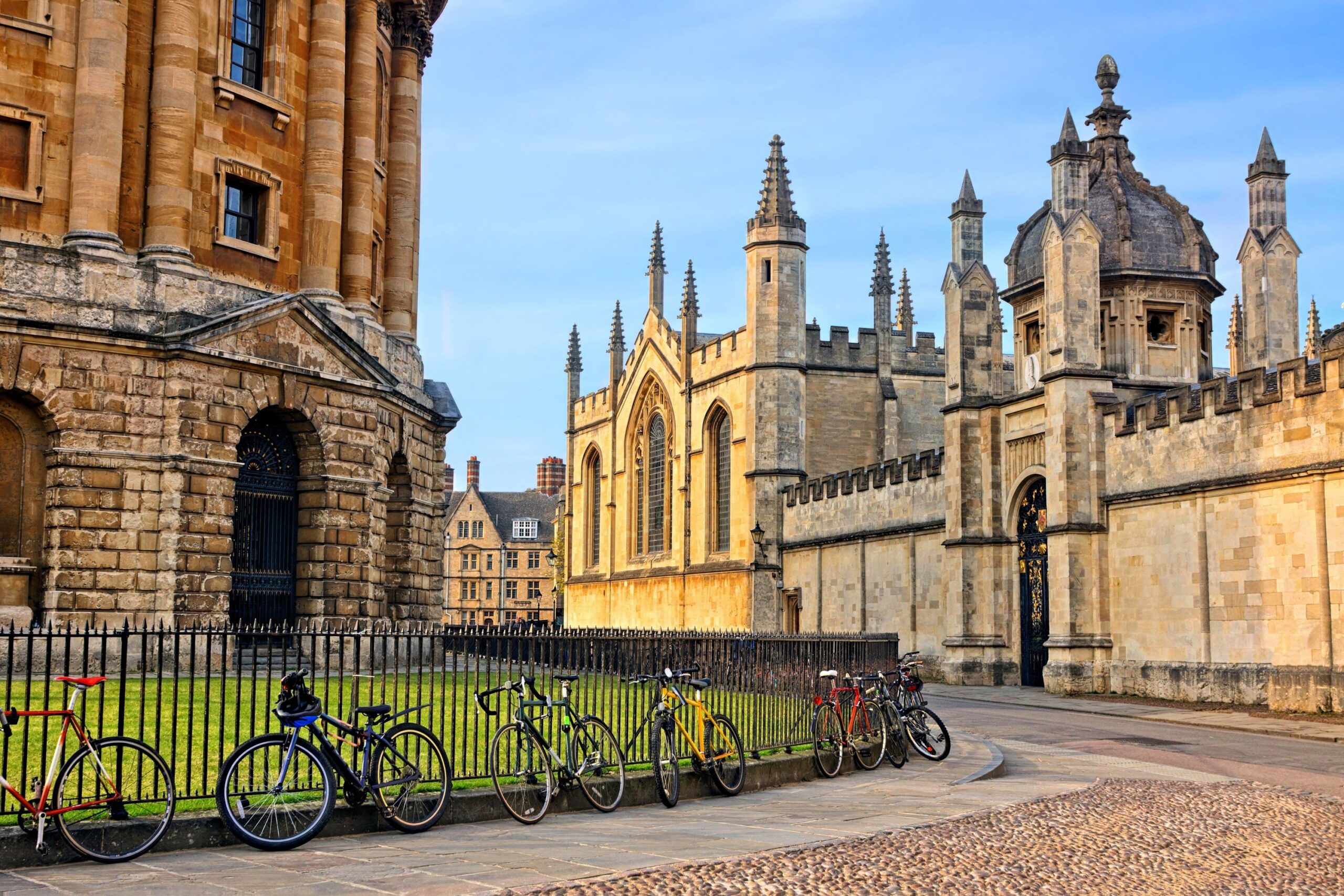 university building with lawn and bike in foreground