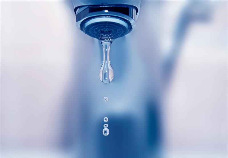 water droplet falling from tap